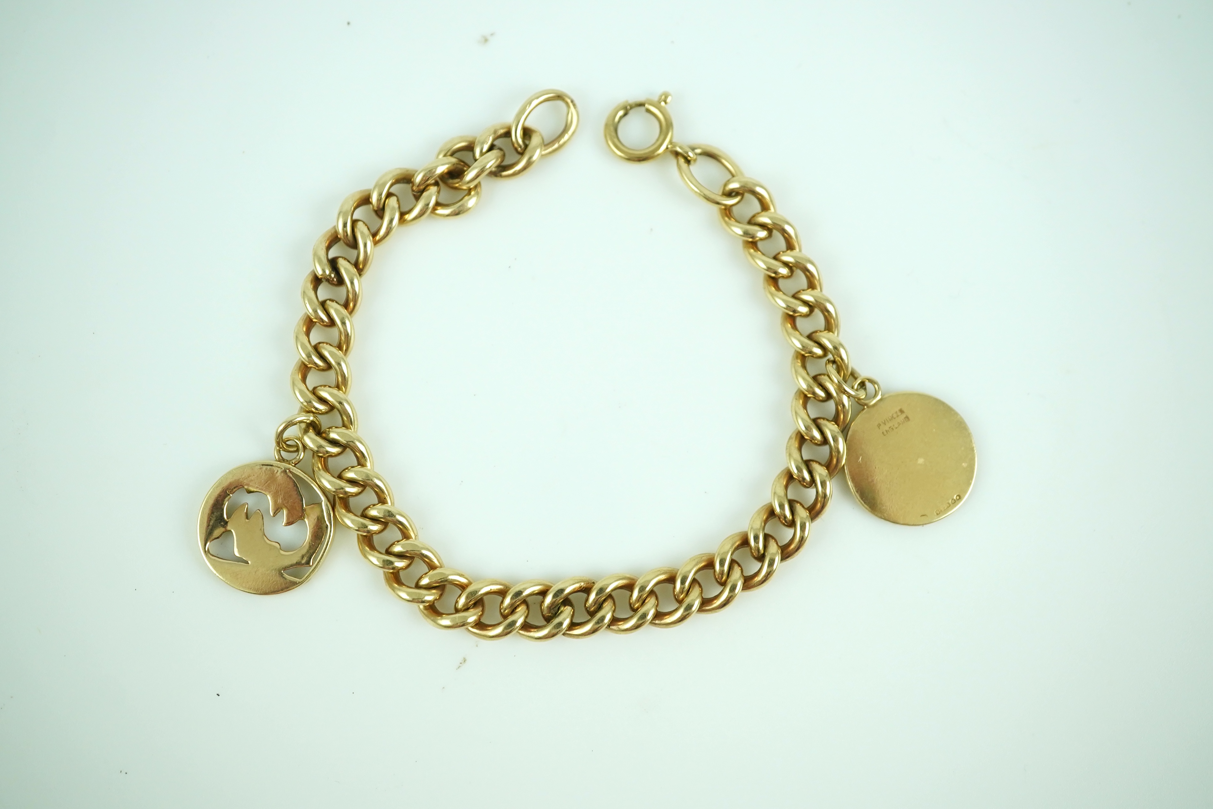 A 9ct gold charm bracelet, circa 1997